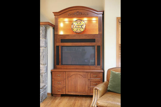 This Armoire was designed to fit in a specific location. It had to accommodate a flat screen TV and new surround sound speakers.